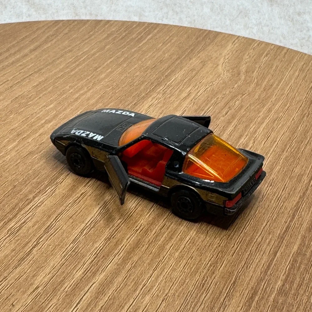 Vintage 1980s matchbox Mazda RX-7 Toy Car Black Diecast Collectible doors open‎